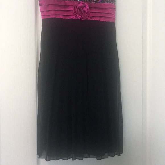 A black and fuschia dress with colorful sequins. - Picture 3 of 5